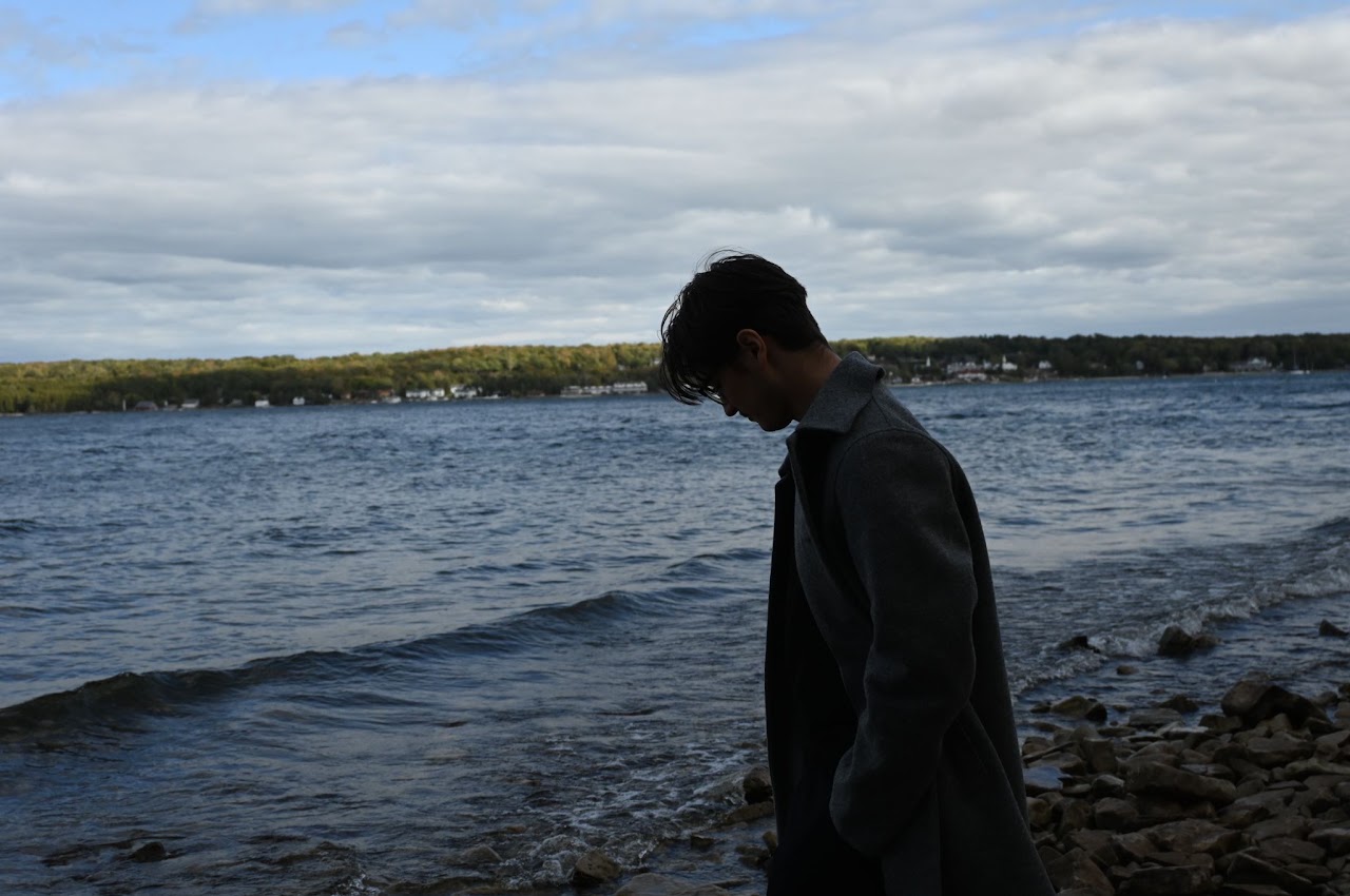 A person beside a lake