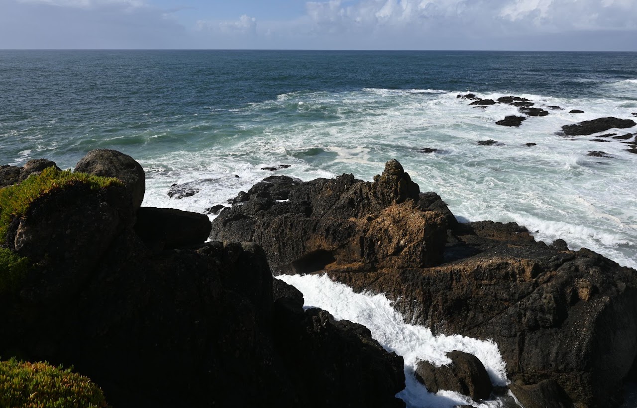 Ocean waves along a rocky shore